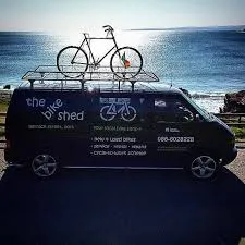 The Bike Shed van in front of the sea